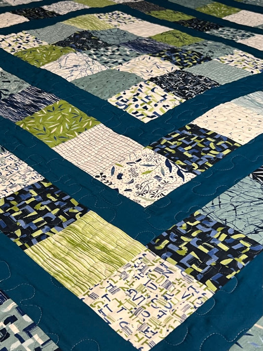 Double or small Queen-sized one-of-a-kind quilt