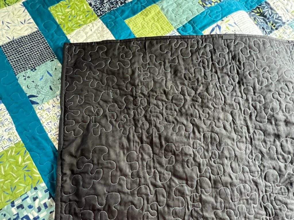 Double or small Queen-sized one-of-a-kind quilt