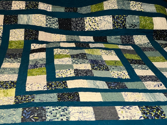 Double or small Queen-sized one-of-a-kind quilt