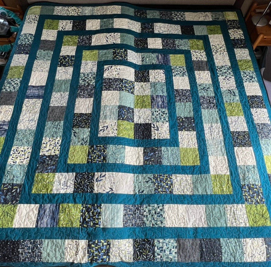 Double or small Queen-sized one-of-a-kind quilt
