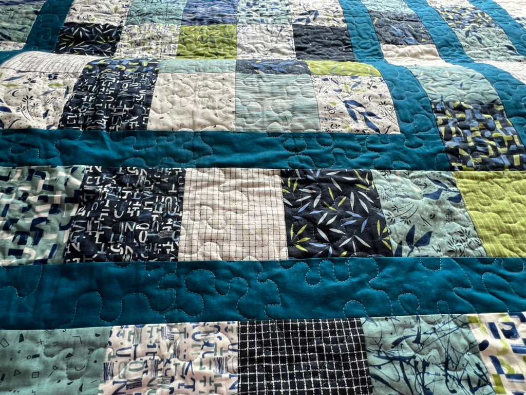 Double or small Queen-sized one-of-a-kind quilt